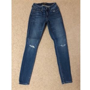 Lucky brand 0/25 skinny jeans with holes on knee
